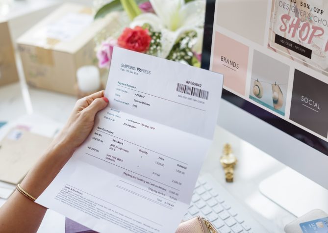 Woman reading payment bill